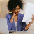 Woman looking at cover letter